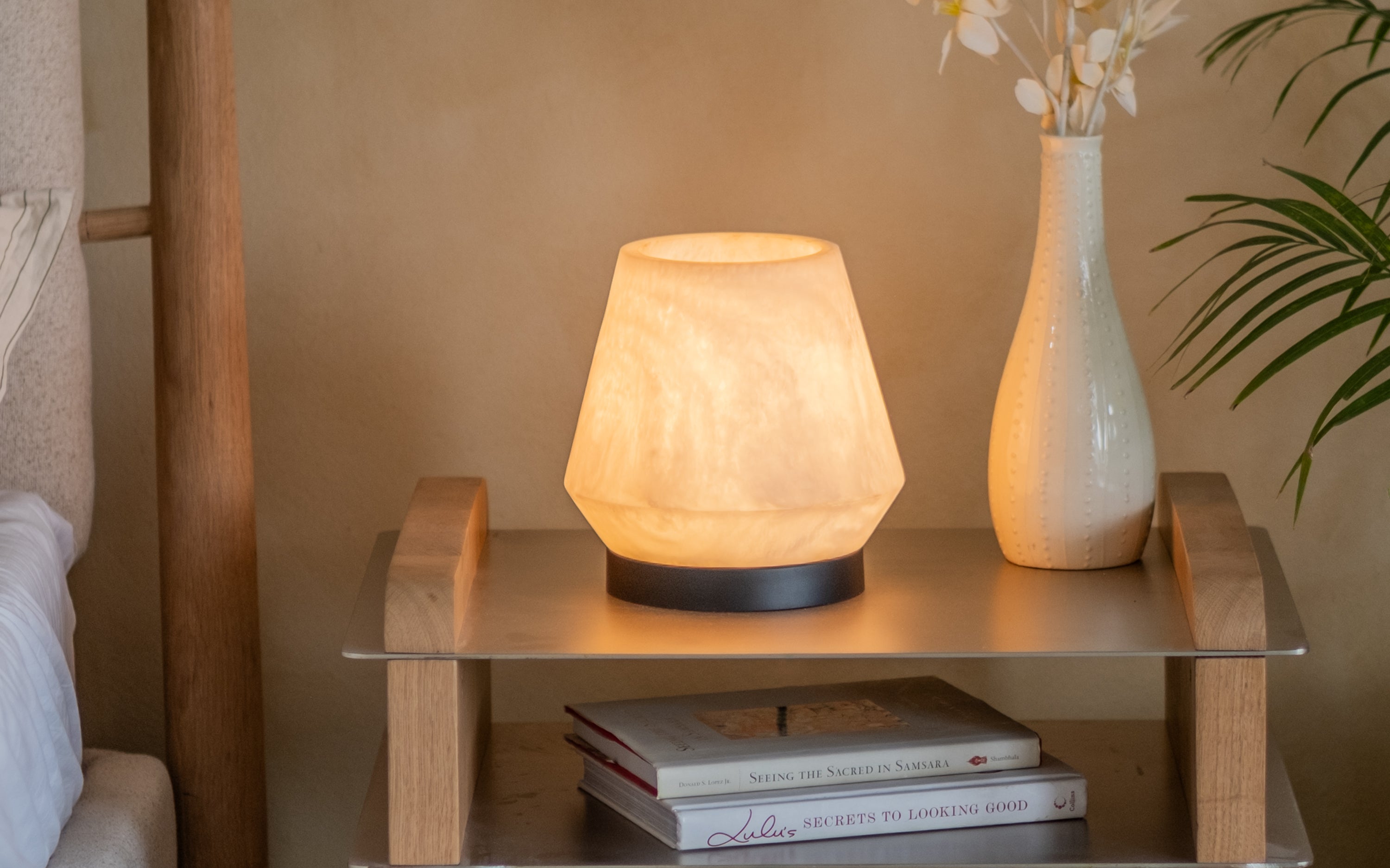 Orira Small Round Table Lamp | Marble Resin with Black Base - Close shot - Orange Tree