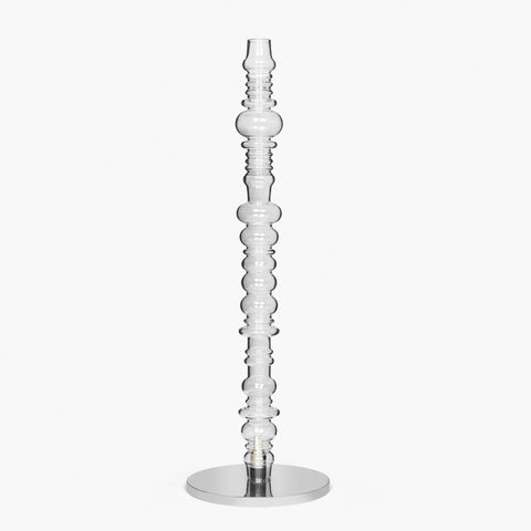 Reef floor lamp with tall glass column and round metal base, modern floor lamp design.