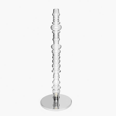 Reef floor lamp with tall sculptural glass column and round metal base, modern floor lamp design with white background