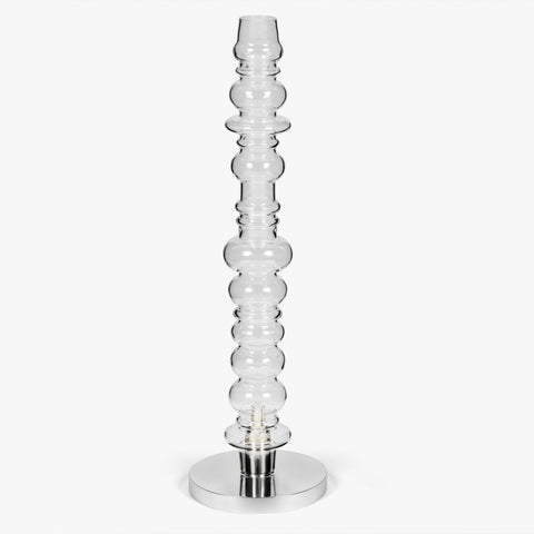 Sculptural clear glass table lamp with stacked glass form and metal base