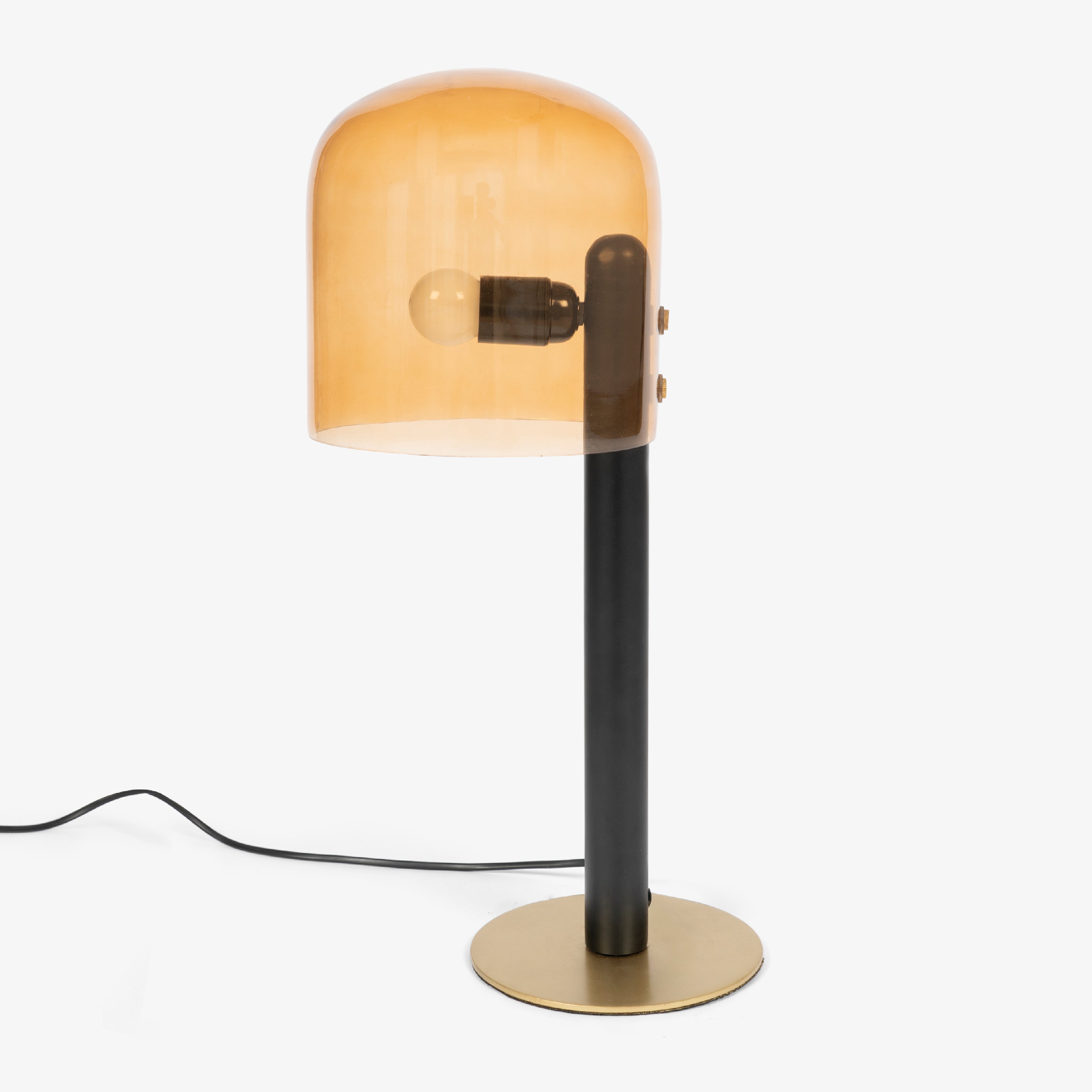 A night lamp for bedroom with a warm amber glow and minimalist black support.