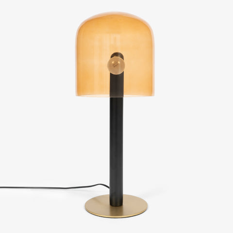 Contemporary bedroom lamps featuring a wide glass shade and brushed gold base.