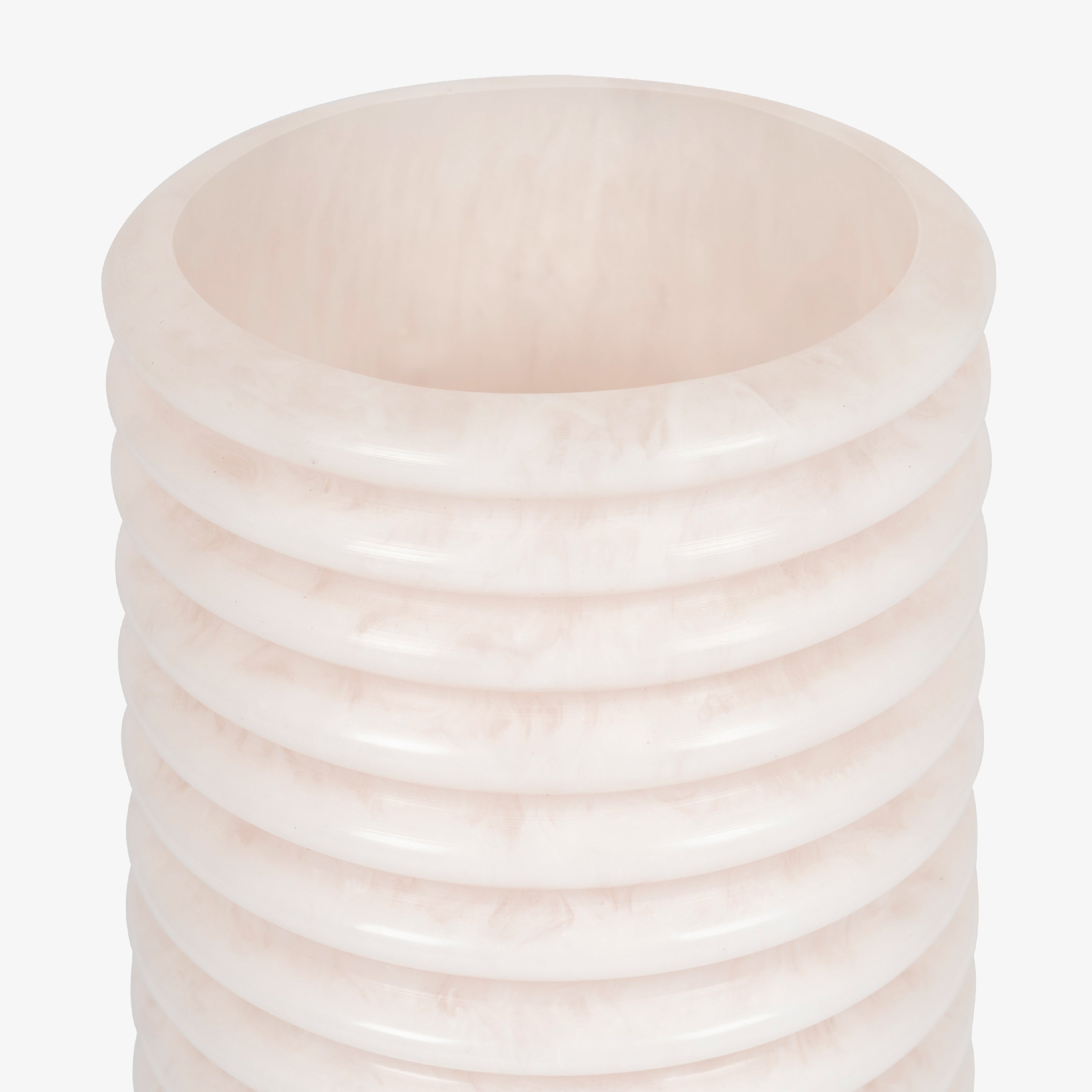 Close-up of the horizontal ribbing on bedroom table lamps, creating a diffused light effect.