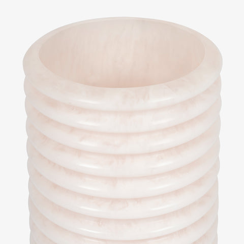 Close-up of the horizontal ribbing on bedroom table lamps, creating a diffused light effect.