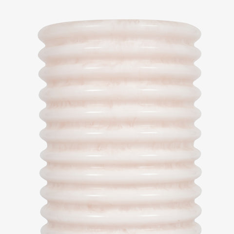 Vertical detail of the ribbed column, a sophisticated choice for side lamps for living room.
