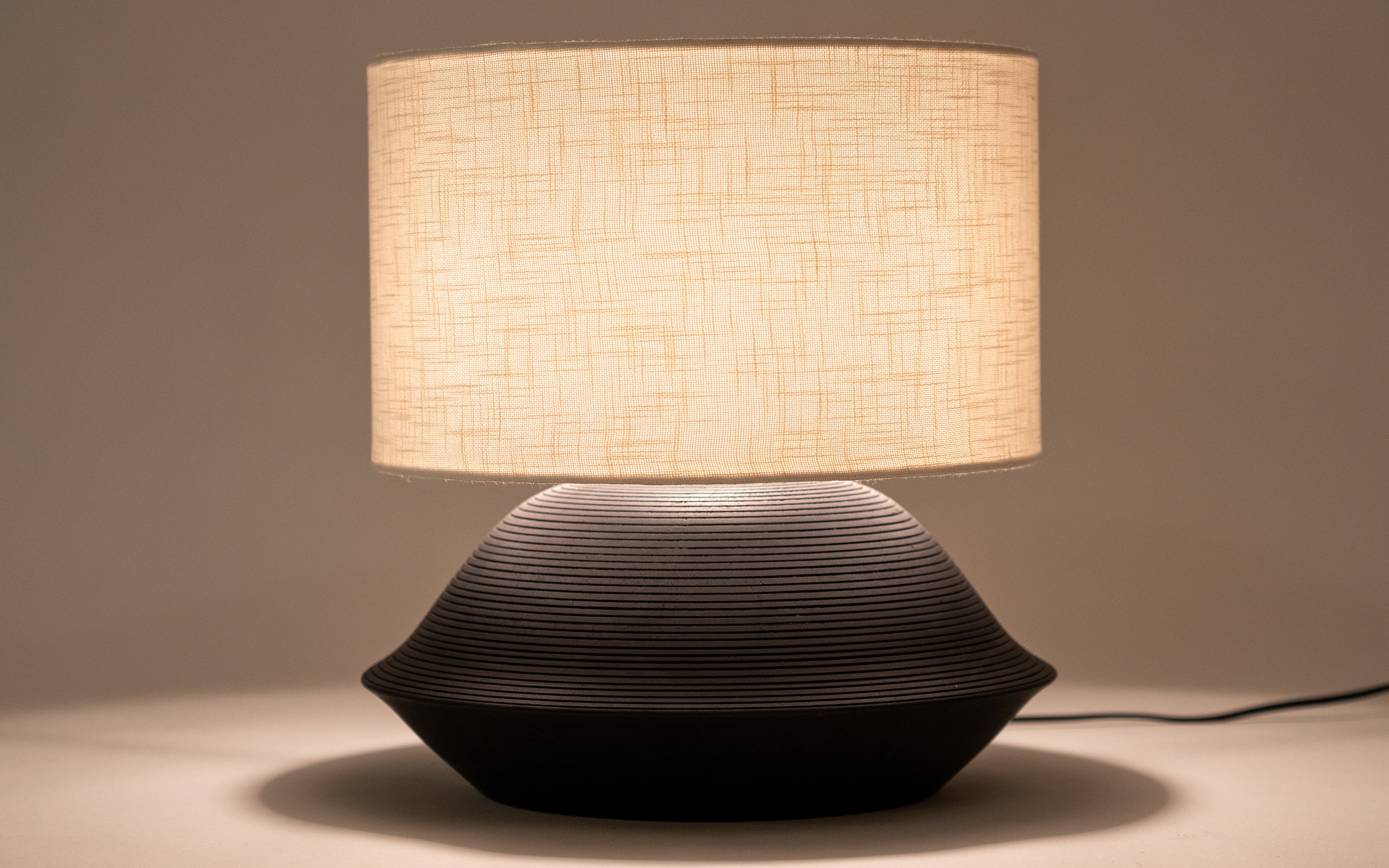 Umbra Squat Table Lamp - Close shot - from left angle - Orange Tree