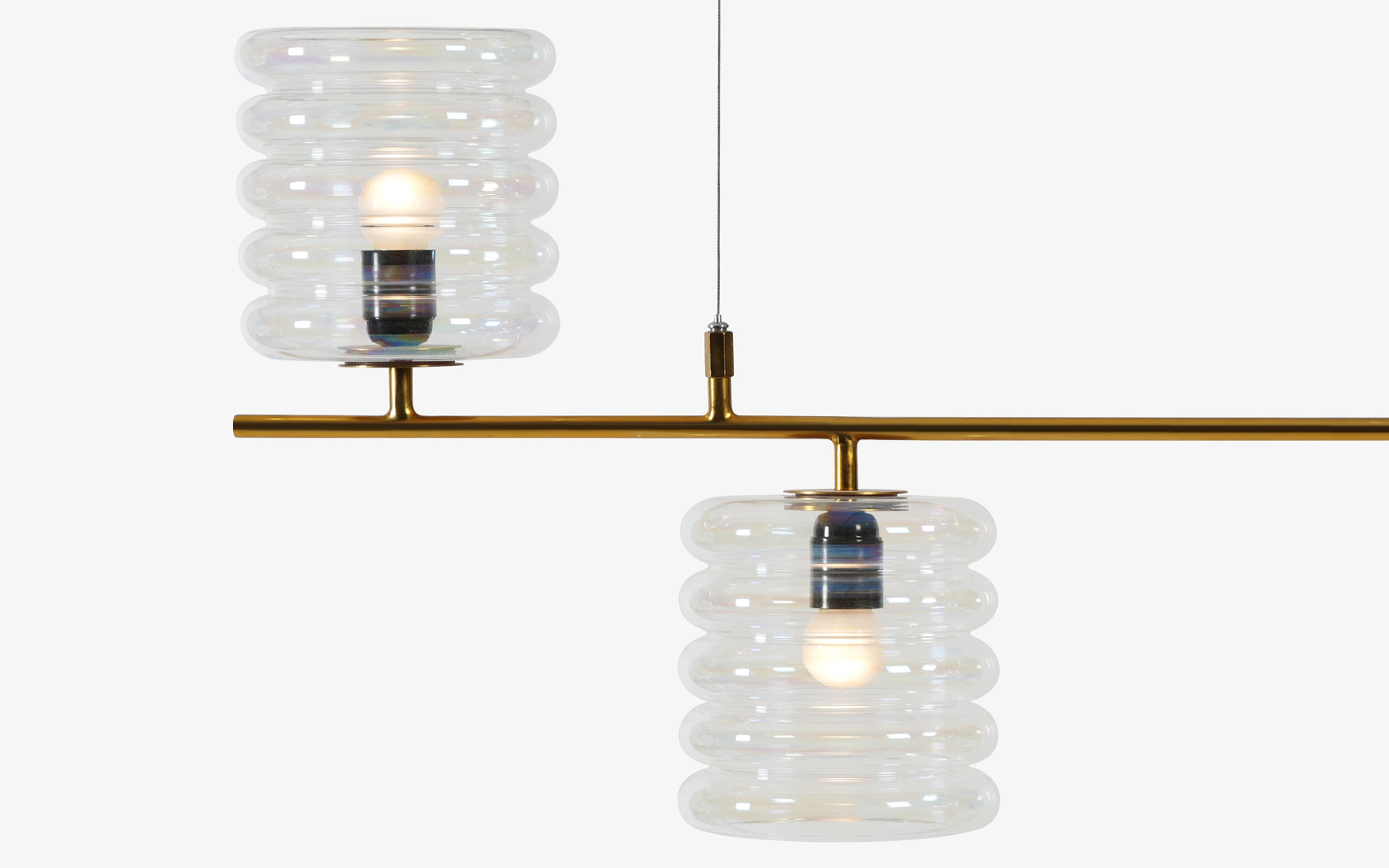 Buy Unio Linear Glass Chandelier Lamp of 4 | Brass Metal Frame - Close shot - from left angle - Orange Tree
