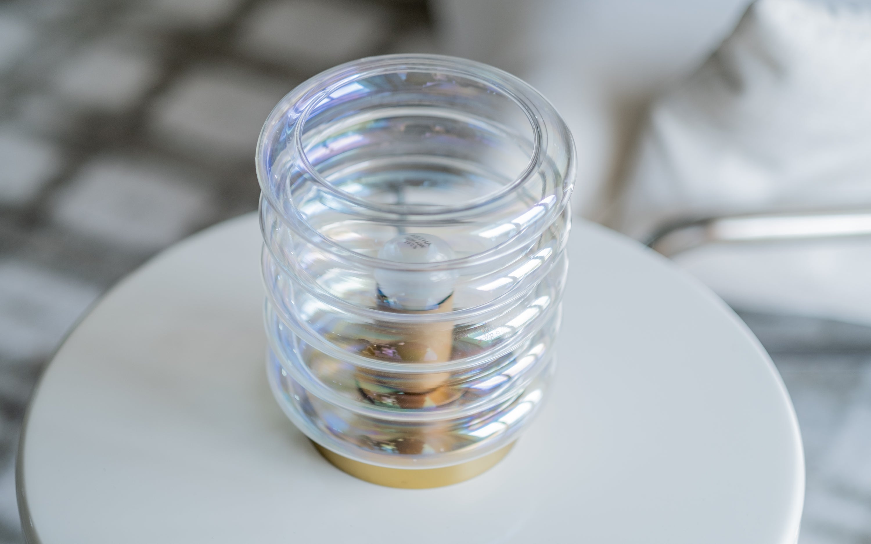 Unio Cylindrical Mini Table Lamp | Rainbow Glass & Brass - Close shot - from left angle - Orange Tree