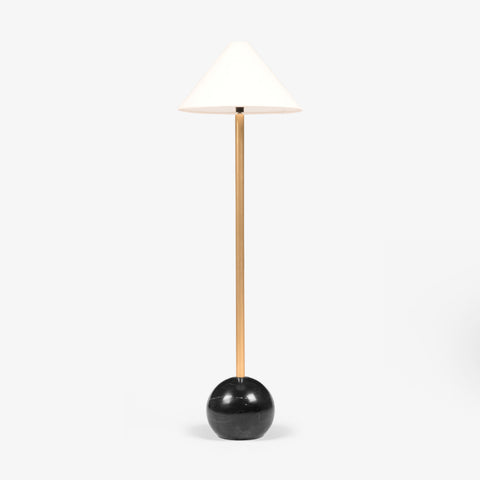 A high-end floor lamp featuring a polished gold stem and a heavy black marble base, ideal for those looking to buy floor lamps online in India.