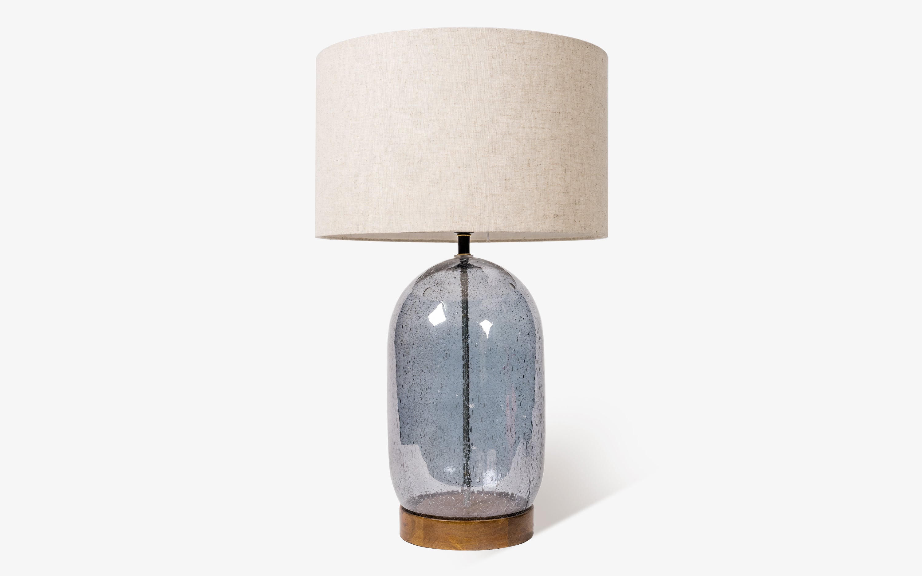 Vibhu Glass Table Lamp with White Linen Shade - with white background - Orange Tree