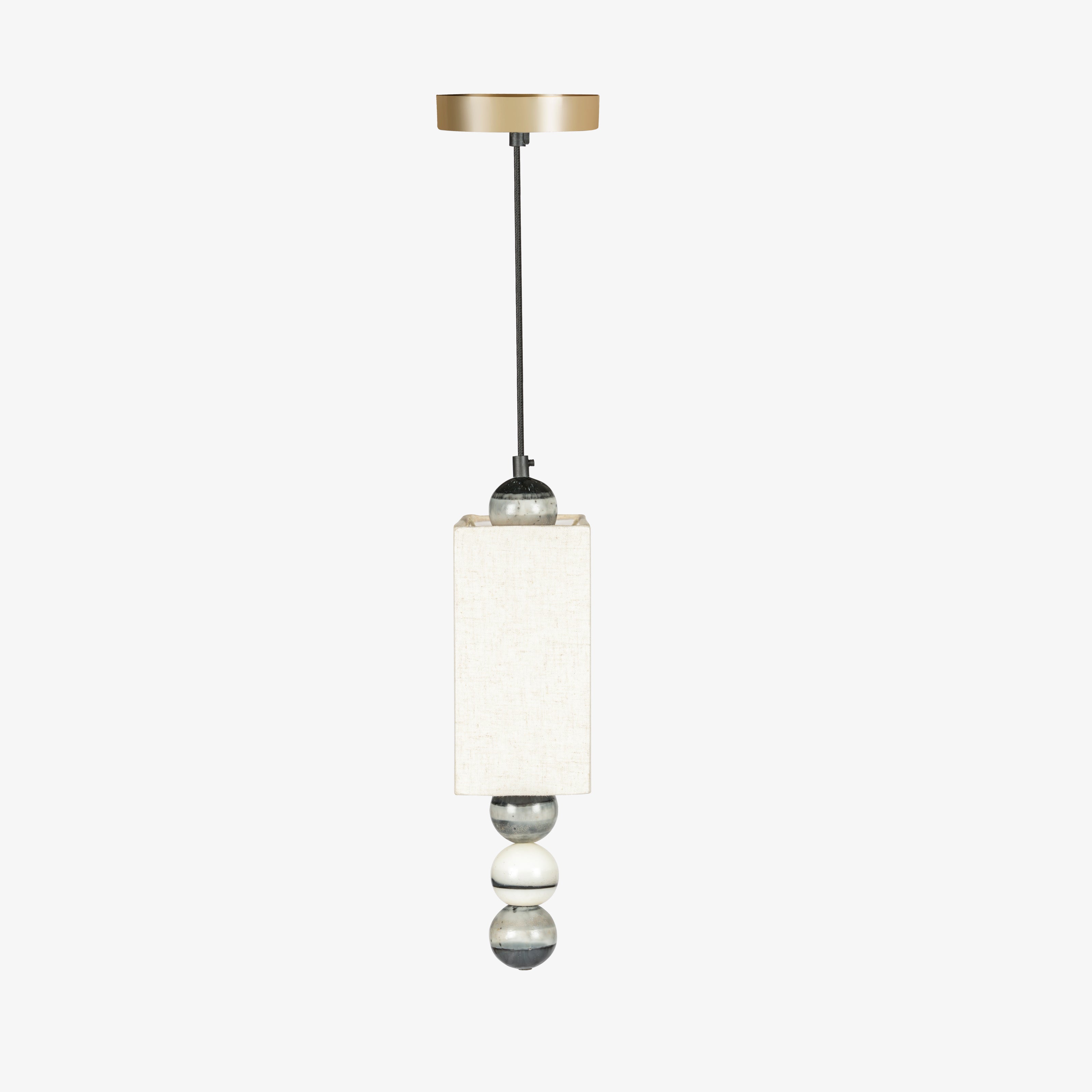 Minimal pendant lamp side view showing fabric shade depth and marble bead detailing, modern ceiling light design.