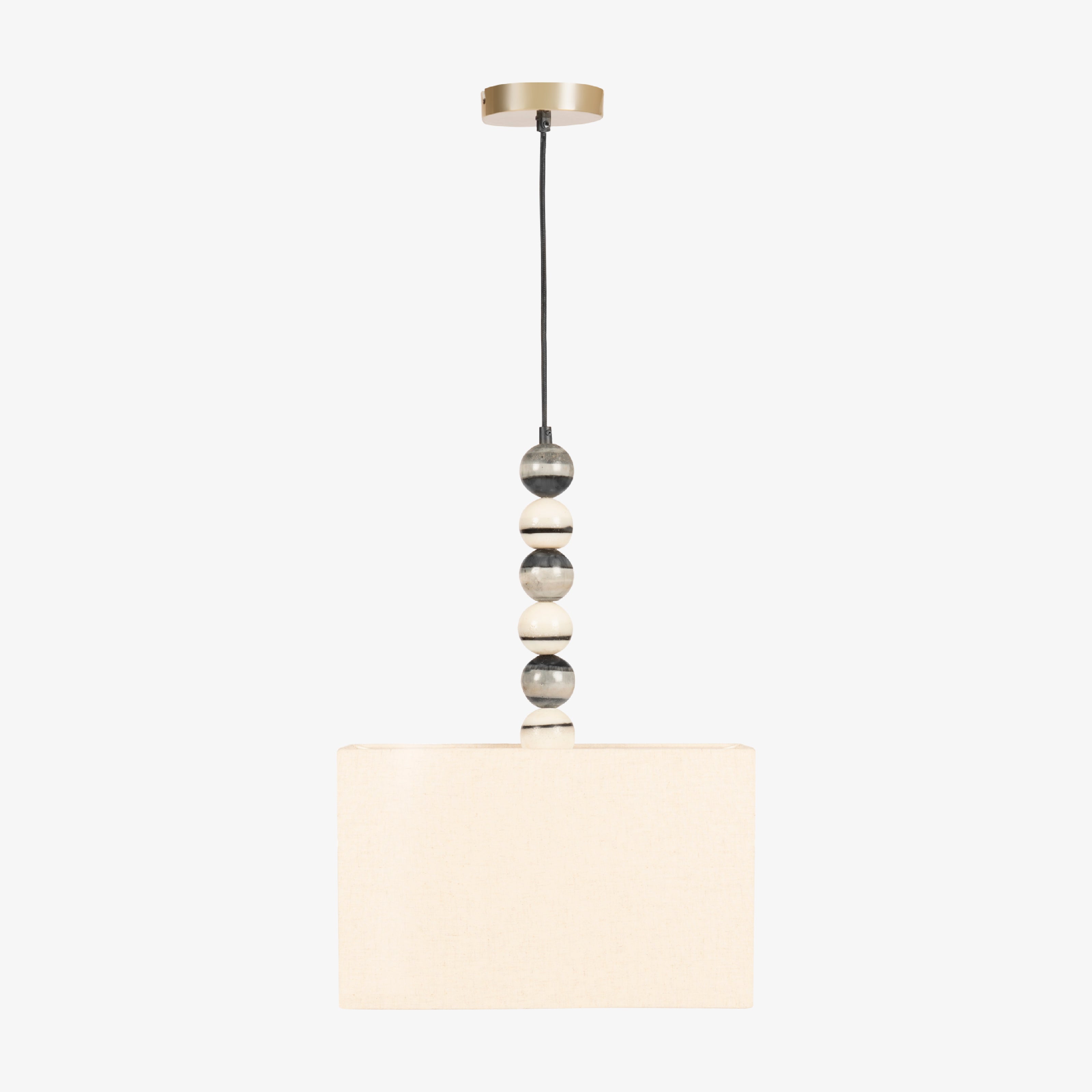 A modern hanging light featuring decorative ceramic beads on a black cord with a neutral drum shade, perfect for bedroom pendant lights