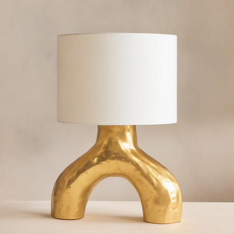 Close-up of the interlocking brass pillars of these bedroom table lamps.