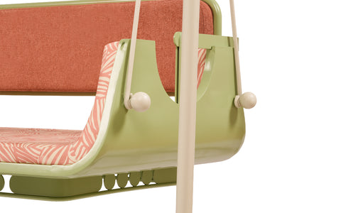 Close-up of a green outdoor swing seat
