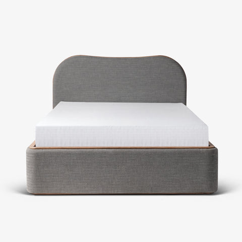 Front view of gray upholstered bed