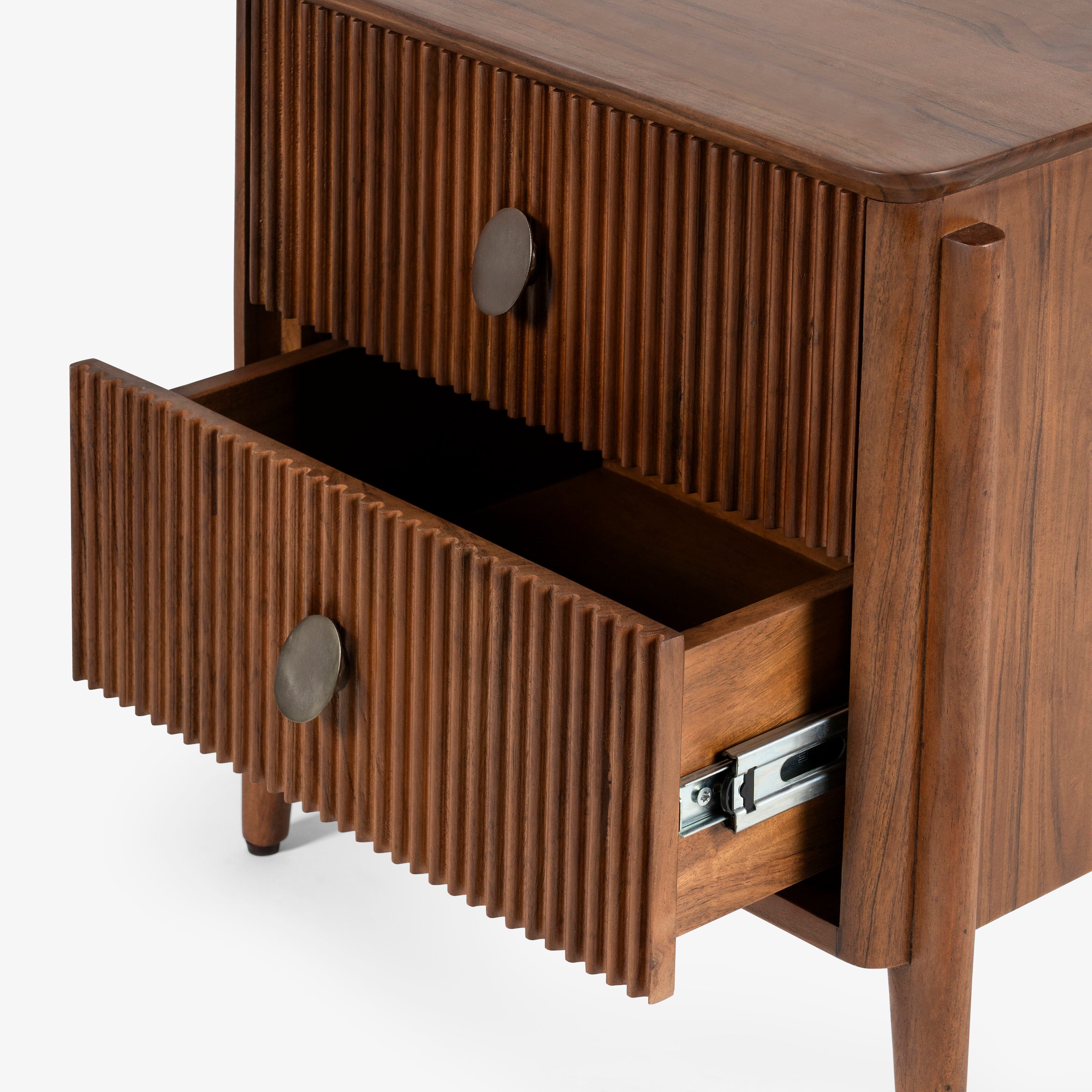 Drawer open on wood bedside table