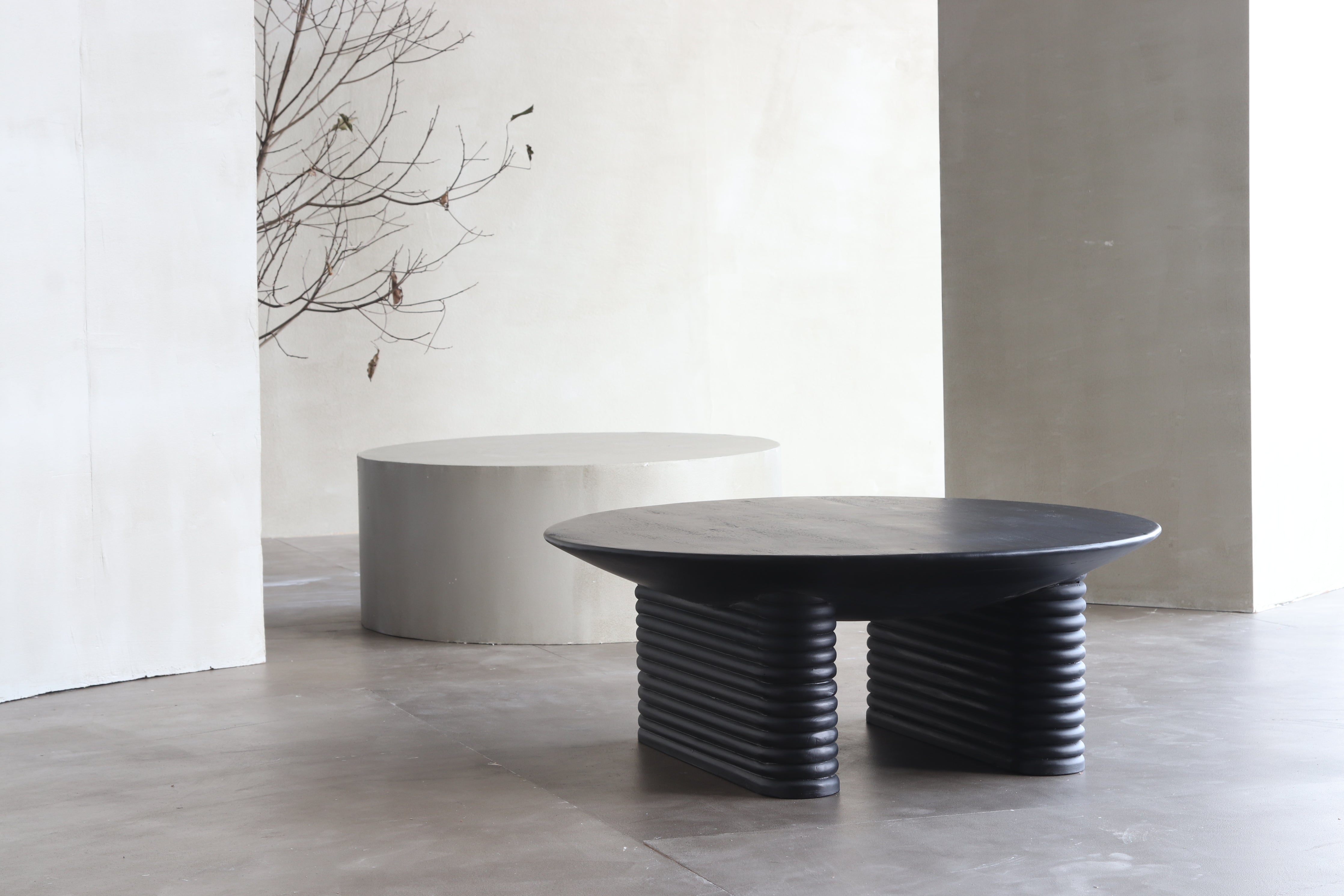 Black Ribbed Round Mango Wood Coffee Table - Close shot - Orange Tree