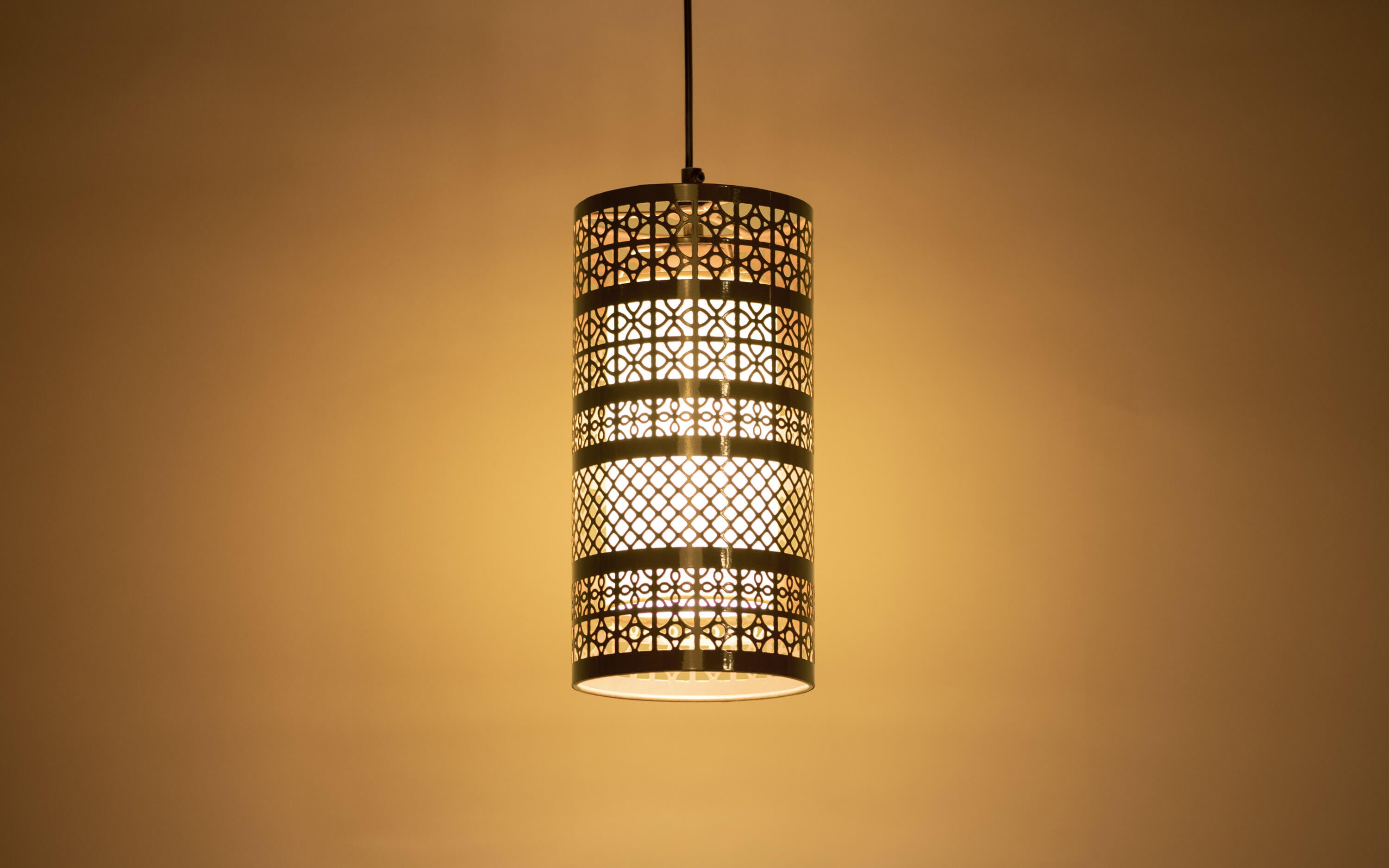 Buy Mandawa Cylindrical Metal Hanging Lamp in Gold - Close shot - Orange Tree