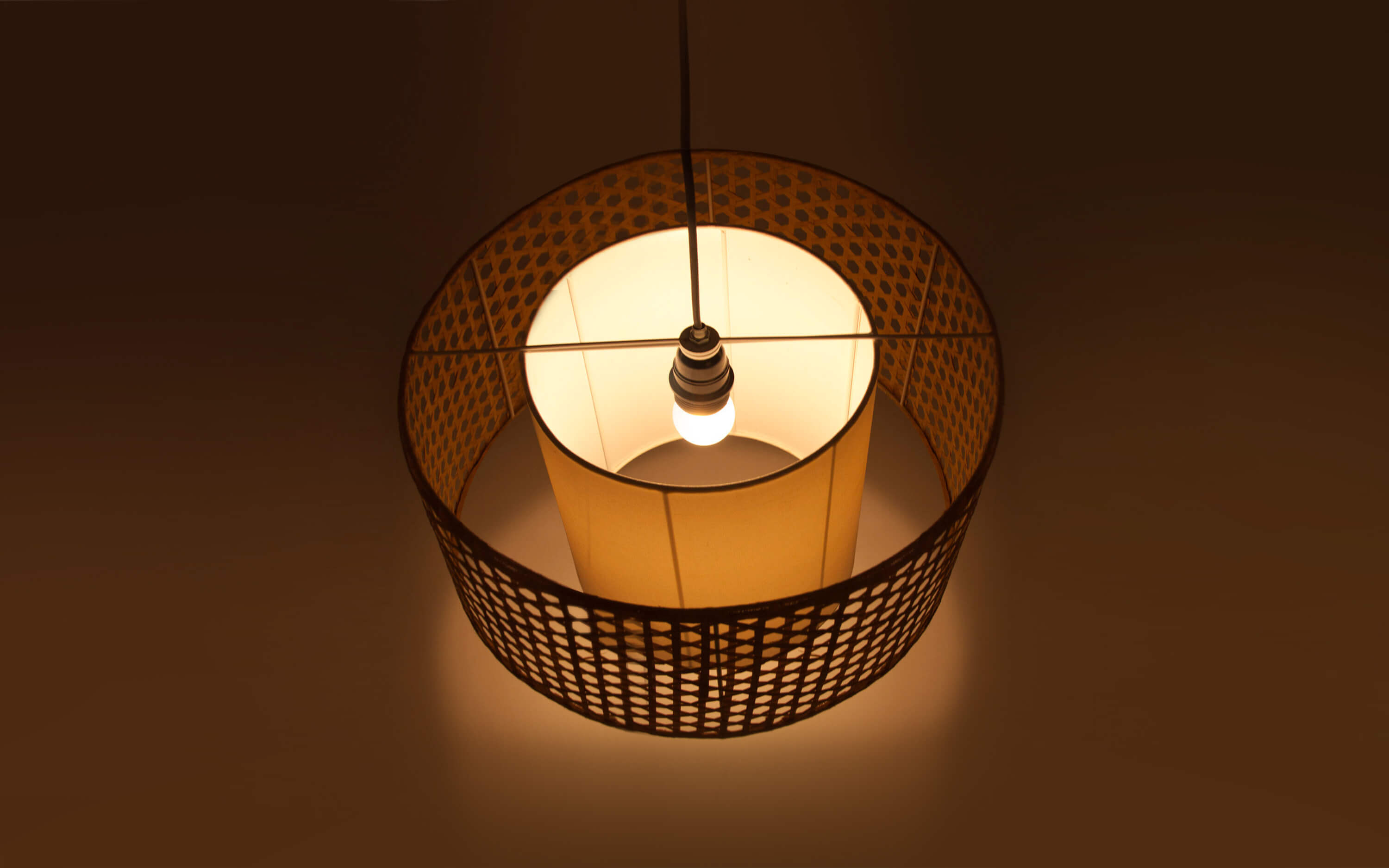 Canna Bamboo Hanging Lamp with Natural Cane Finish - Close shot - from left angle - Orange Tree